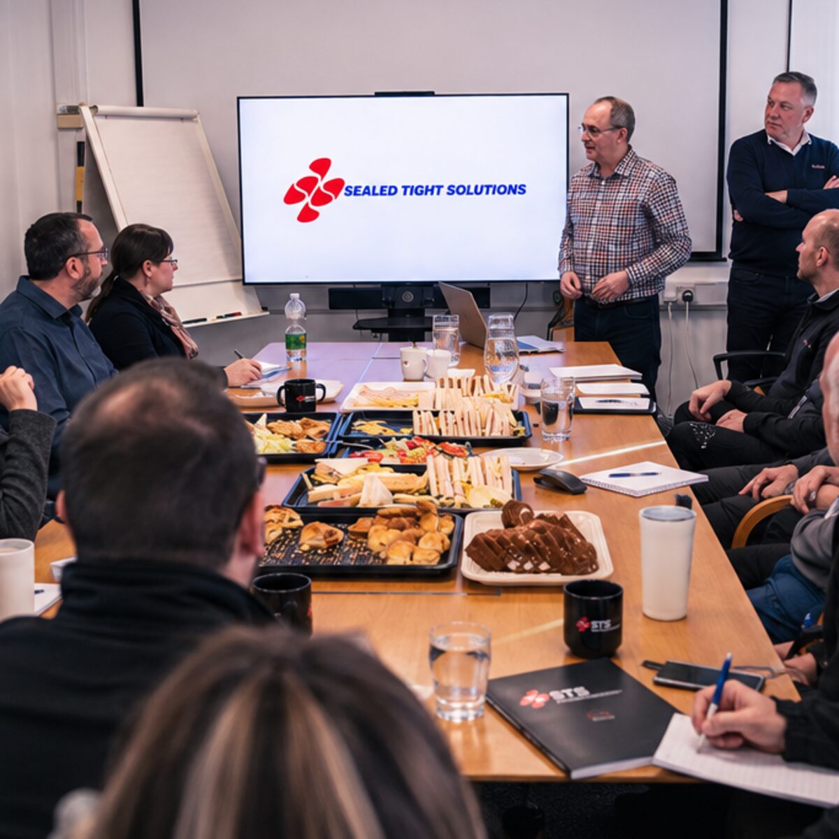 The Sealed Tight Solutions team in a meeting at our Ryton facility